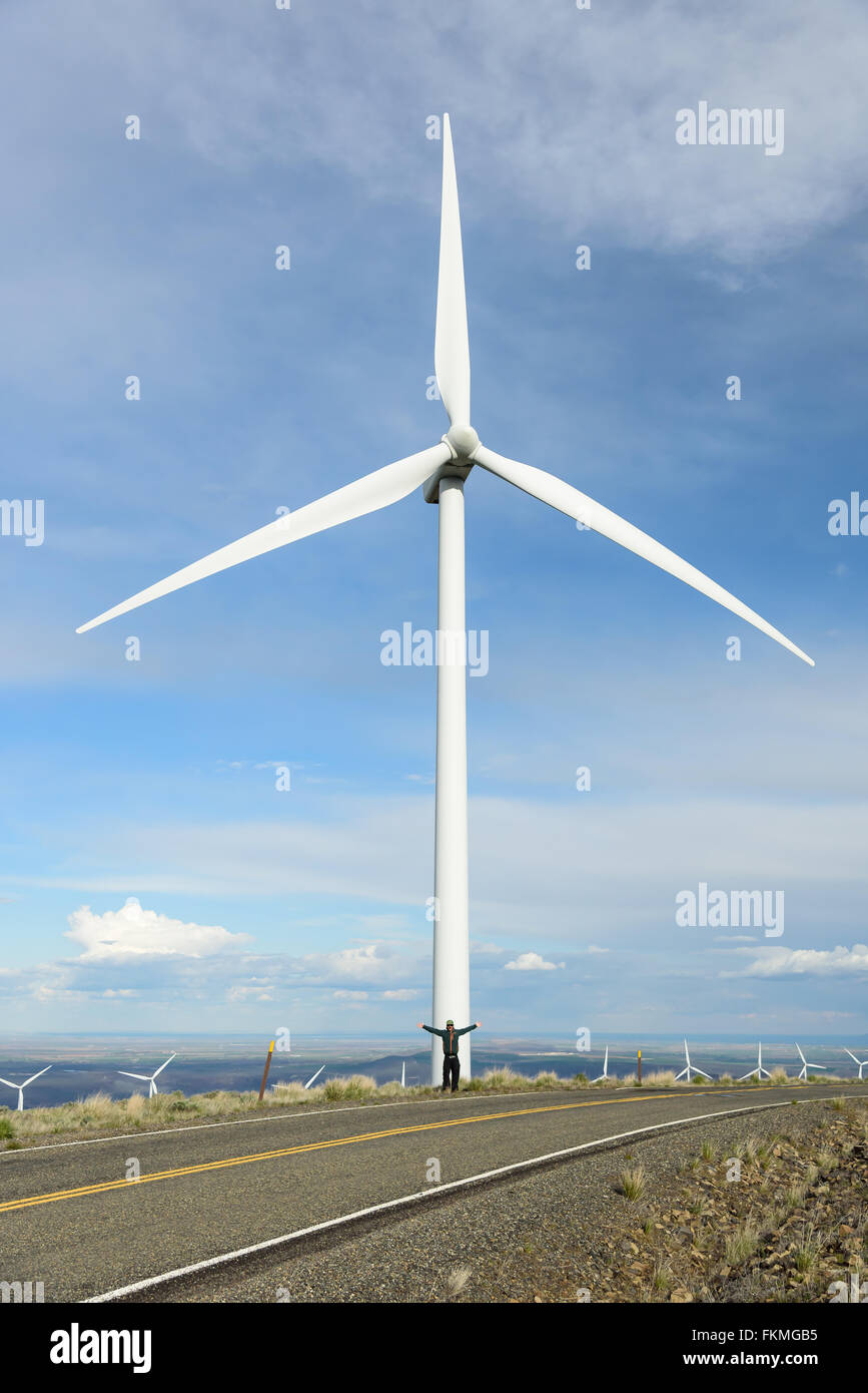 Wild Horse Wind and Solar Facility Washington USA with a person to illustrate the size of the machine Stock Photo