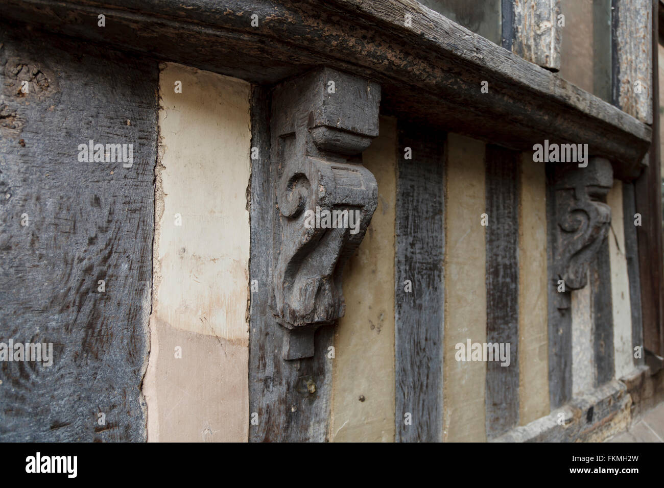 Carved wooden support on the side of  The Ancient High House Stafford England GB UK Stock Photo