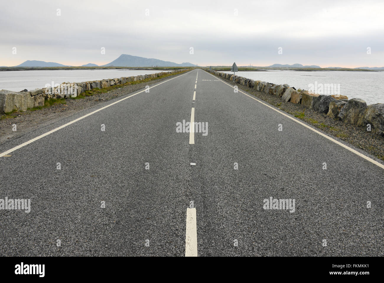 Looking North East along the causeway between Benbecula and Grimsay, North Uist, Outer Hebrides, Scotland Stock Photo