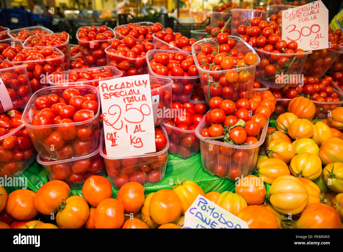 Fresh tomatoes for sale at a traditional Italian market.  Concepts could include food, health, culture, travel, and others. Stock Photo