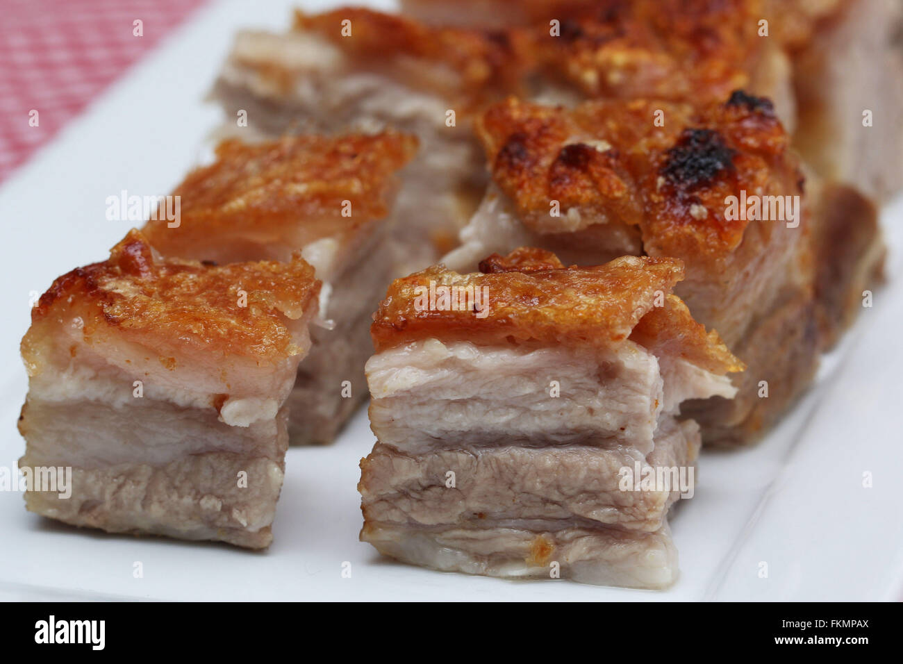 Delicious roasted pork belly cubes Stock Photo