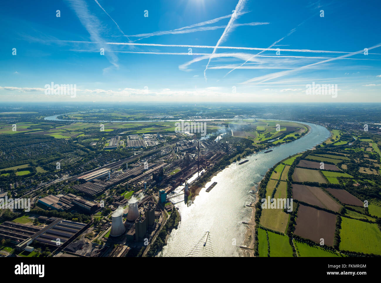 Aerial view, industrial area on the Rhine, Duisburg-Huckingen, Krupp Mannesmann steelworks, Rheinbogen at Beeckerwerth Stock Photo