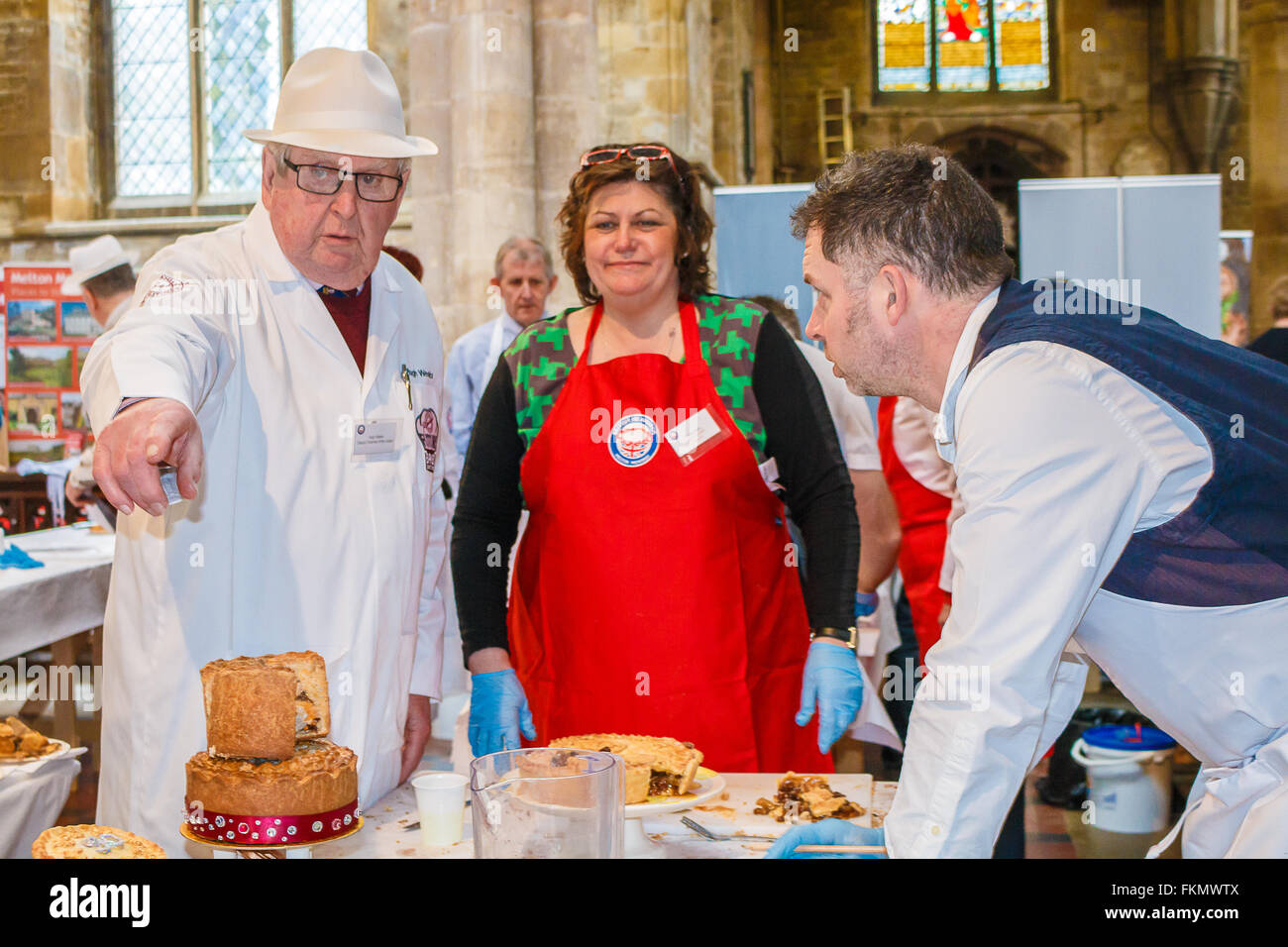 Melton Mowbray, Leicestershire. 9th March 2016. The British Pie Awards were held in St. Mary's church, Melton Mowbray, Leicestershire on Wednesday 9th March 2016. This annual event attracted pie makers from all over the world and were judged by celebrity chefs and food wrers and critics. A pie has to have a crust on the bottom as well as on the top, irrespective of what the filling may be. In each of the classes a champion will be selected and then the champion from each category will compete for supreme champion. Credit:  Jim Harrison/Alamy Live News Stock Photo