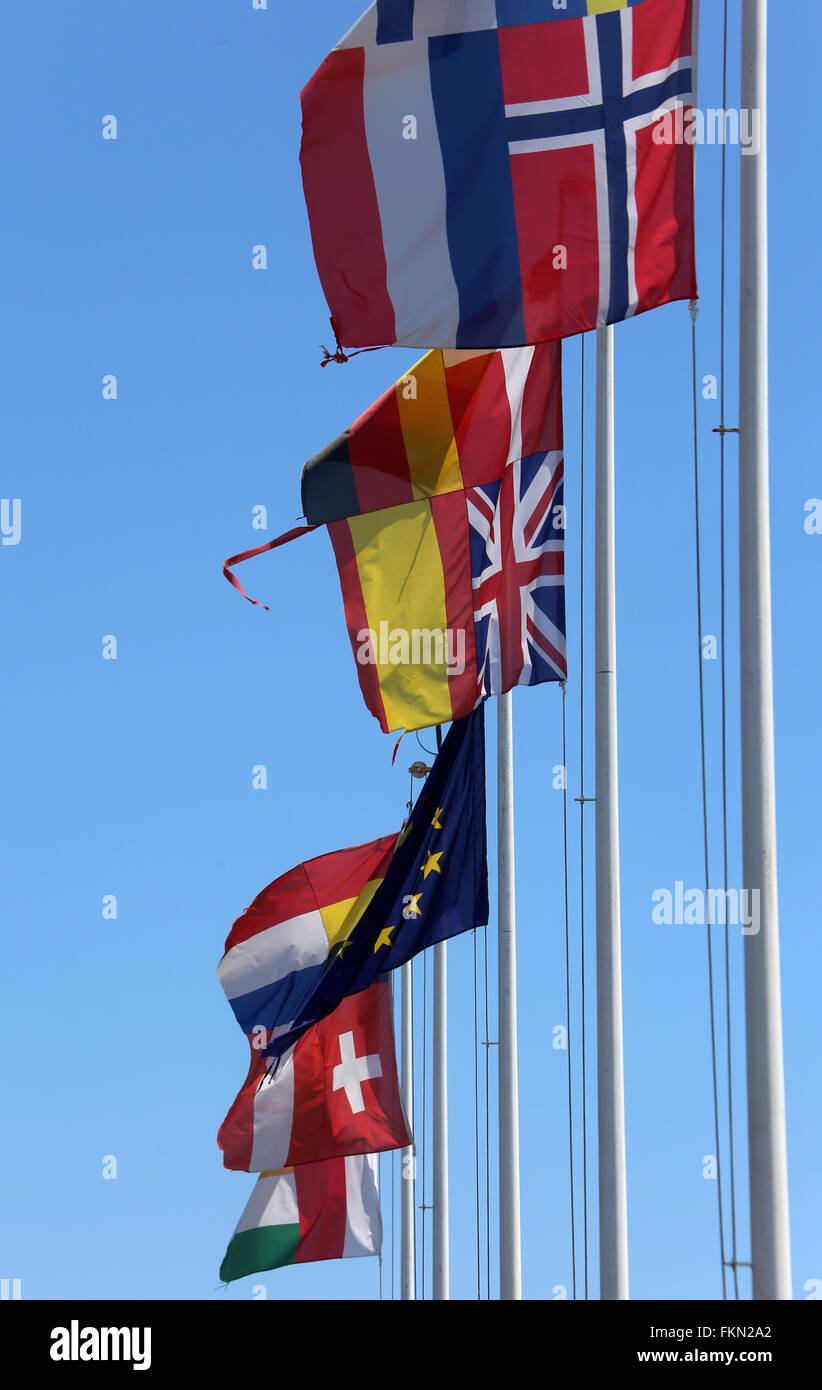 many flags of many nations world waving Stock Photo