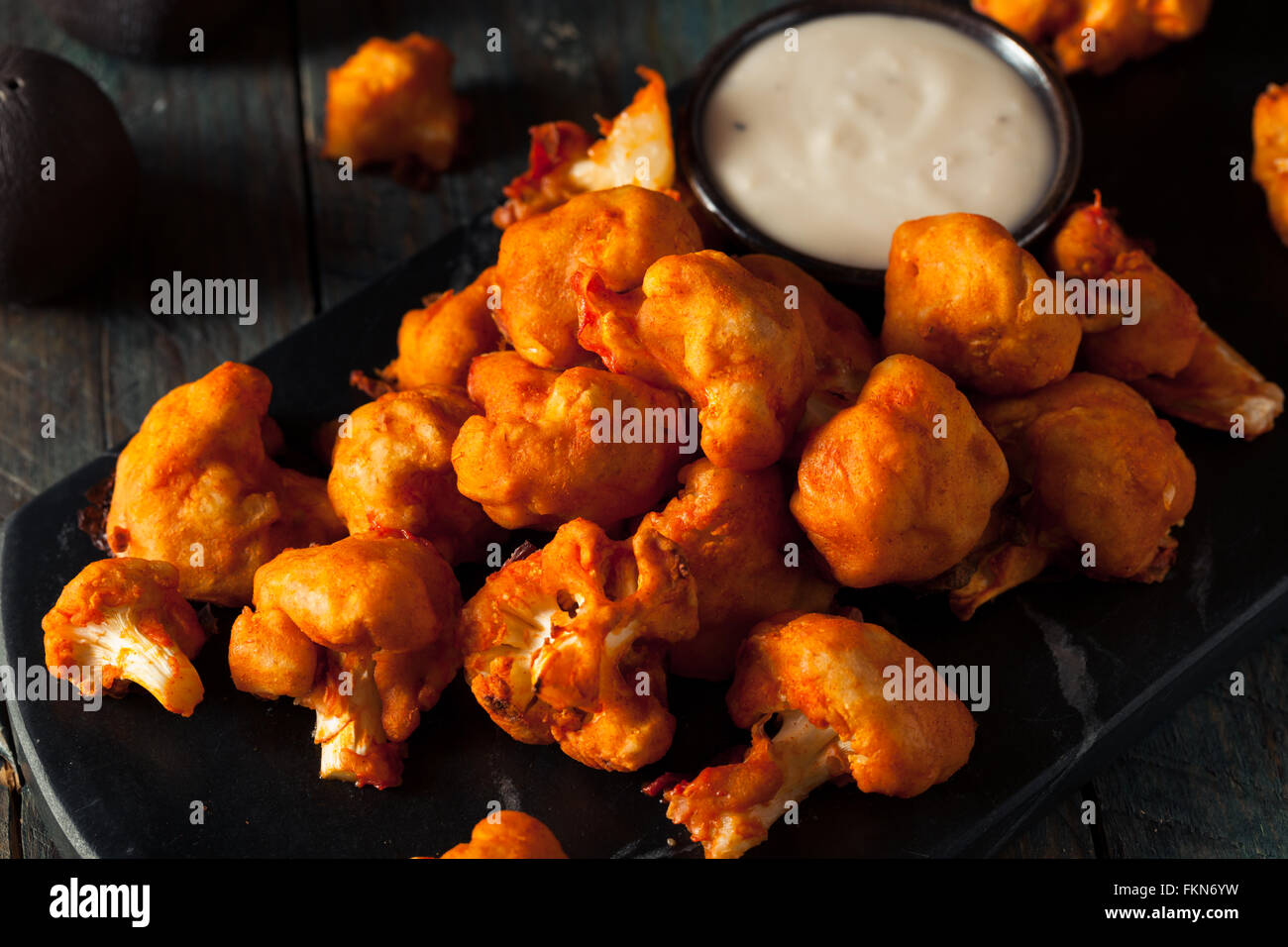 Spicy Breaded Buffalo Chicken Cauliflower with Blue Cheese Sauce Stock