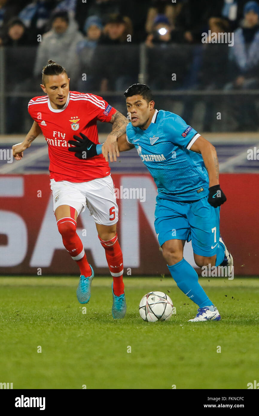 St. Petersburg, Russia. 9th March, 2016. Hulk (R) of Zenit and Ljubomir Fejsa of Benfica vie for the ball during the UEFA Champions League Round of 16 second leg match between FC Zenit St. Petersburg and SL Benfica at Petrovsky stadium. Credit:  Mike Kireev/Alamy Live News Stock Photo