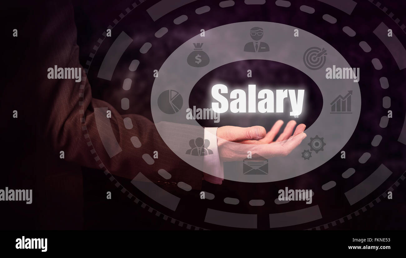 Businessman pressing an Salary concept button. Stock Photo