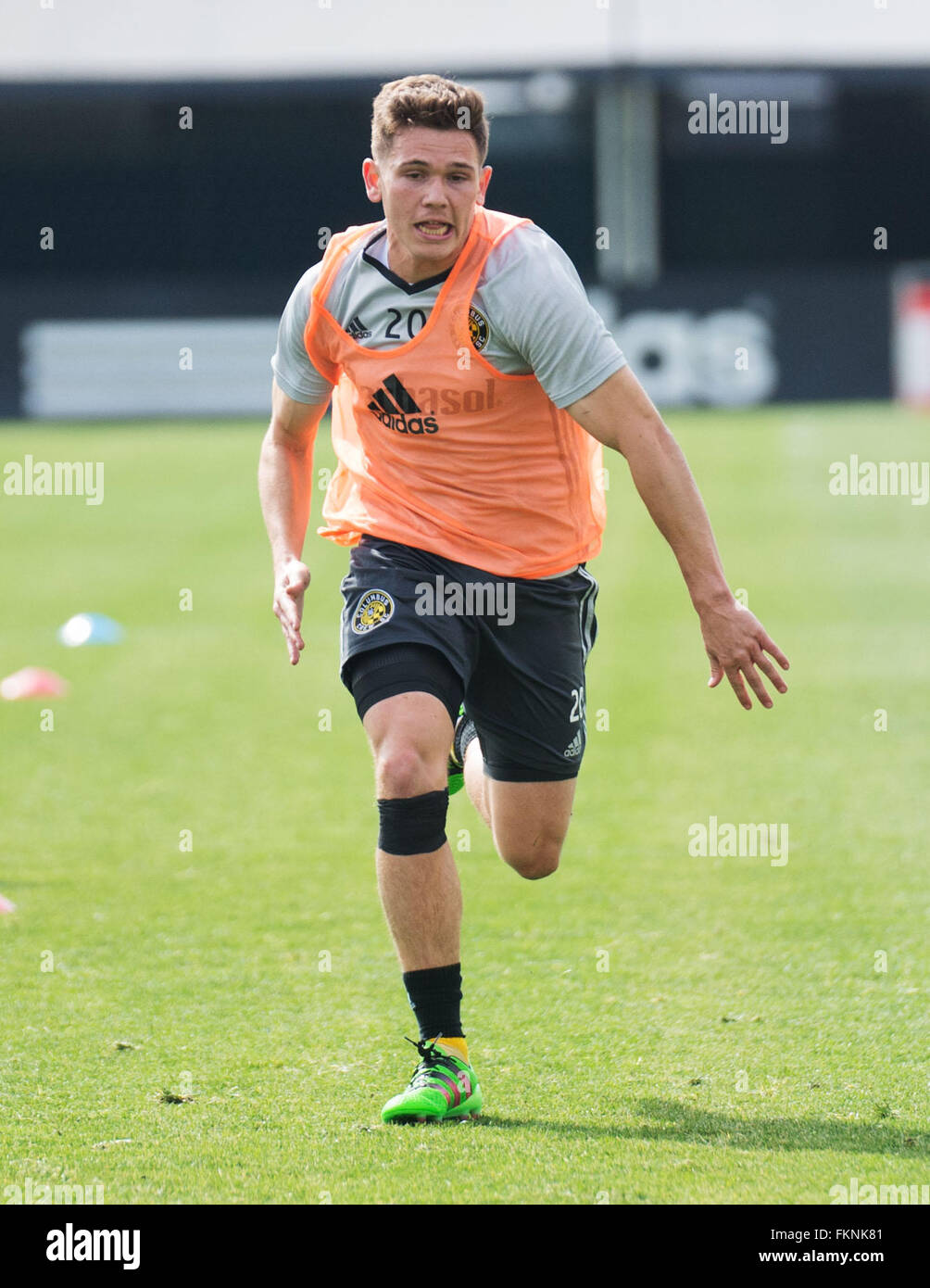 Columbus, Ohio, USA. 9th March, 2016. Columbus Crew SC midfielder Wil Trapp (20) charges down the pitch during a sprinting drill at Columbus Crew SC Media Day. Columbus, Ohio, USA Credit:  Brent Clark/Alamy Live News Stock Photo
