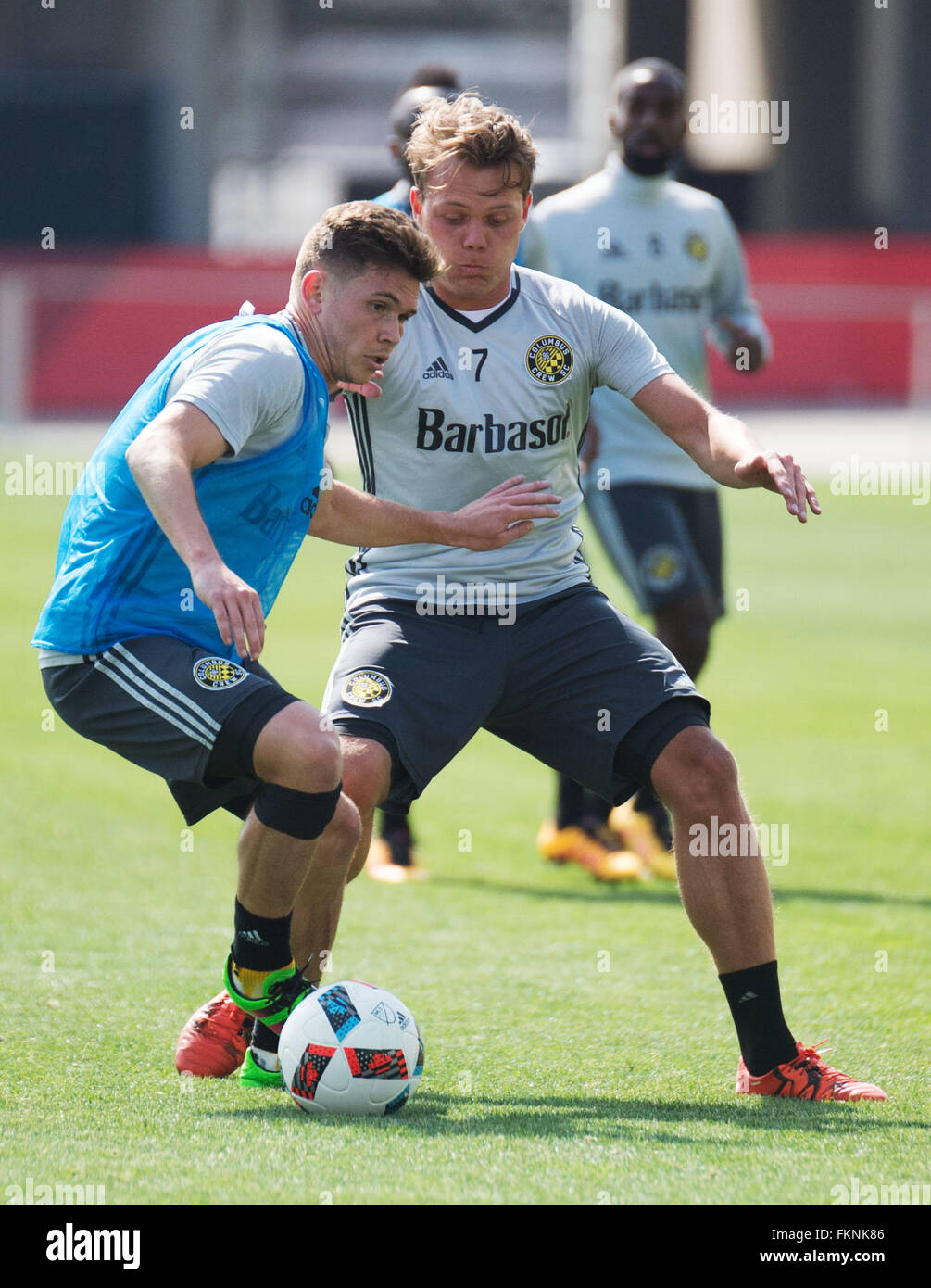 Columbus, Ohio, USA. 9th March, 2016. Columbus Crew SC midfielder Wil Trapp (blue) goes one on one against midfielder Emil Larson during practice at Columbus Crew SC Media Day. Columbus, Ohio, USA Credit:  Brent Clark/Alamy Live News Stock Photo