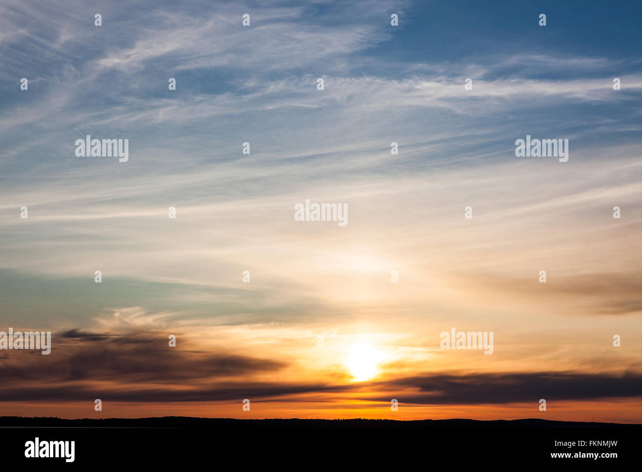 Calm sunset and clouds over lake Stock Photo - Alamy