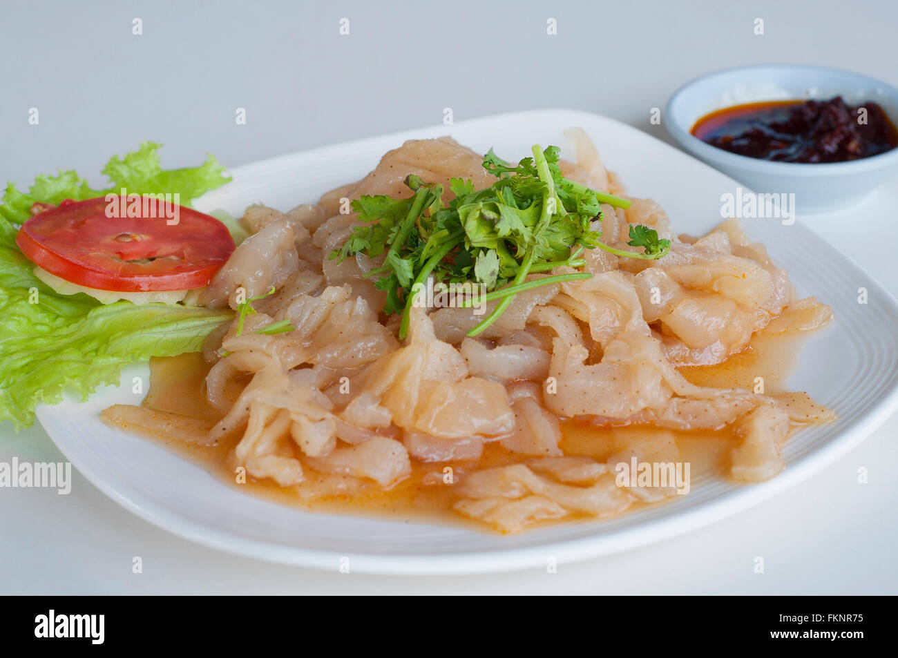 Jellyfish fried in sesame oil, Chinese seafood cuisine. Stock Photo