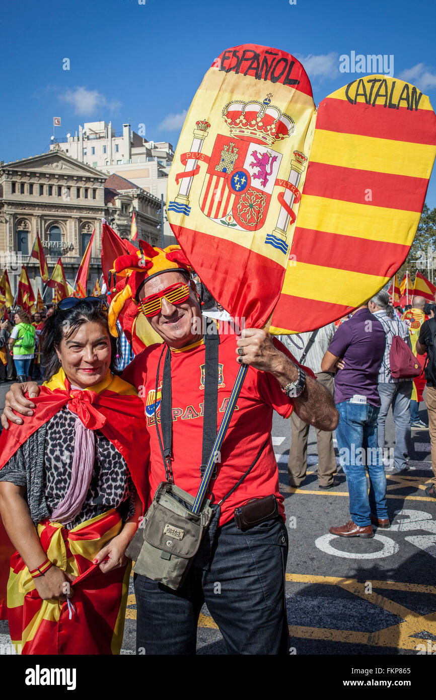 Anti-independence Catalan protestors carry Spanish and catalan flag during a demonstration for the unity of Spain on the occasio Stock Photo