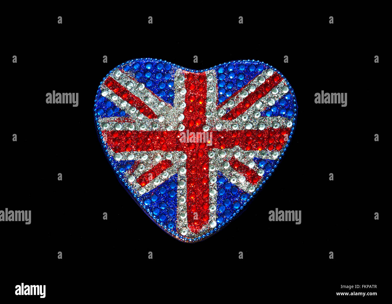 Heart shaped reflective sparkling English British Union Jack Flag motif on black background Stock Photo