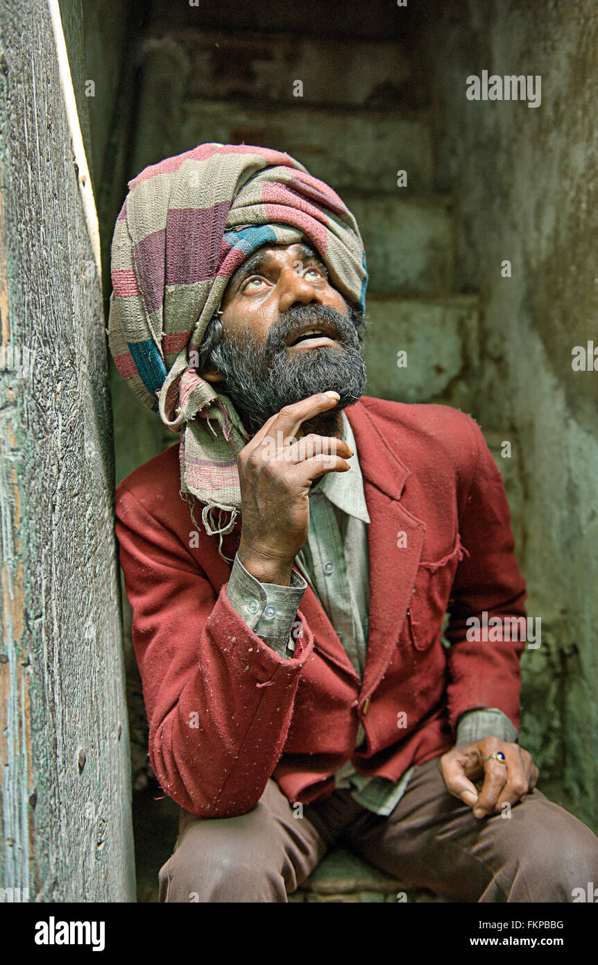 Indian local people pose for camera in the street of Old Delhi, India. Stock Photo