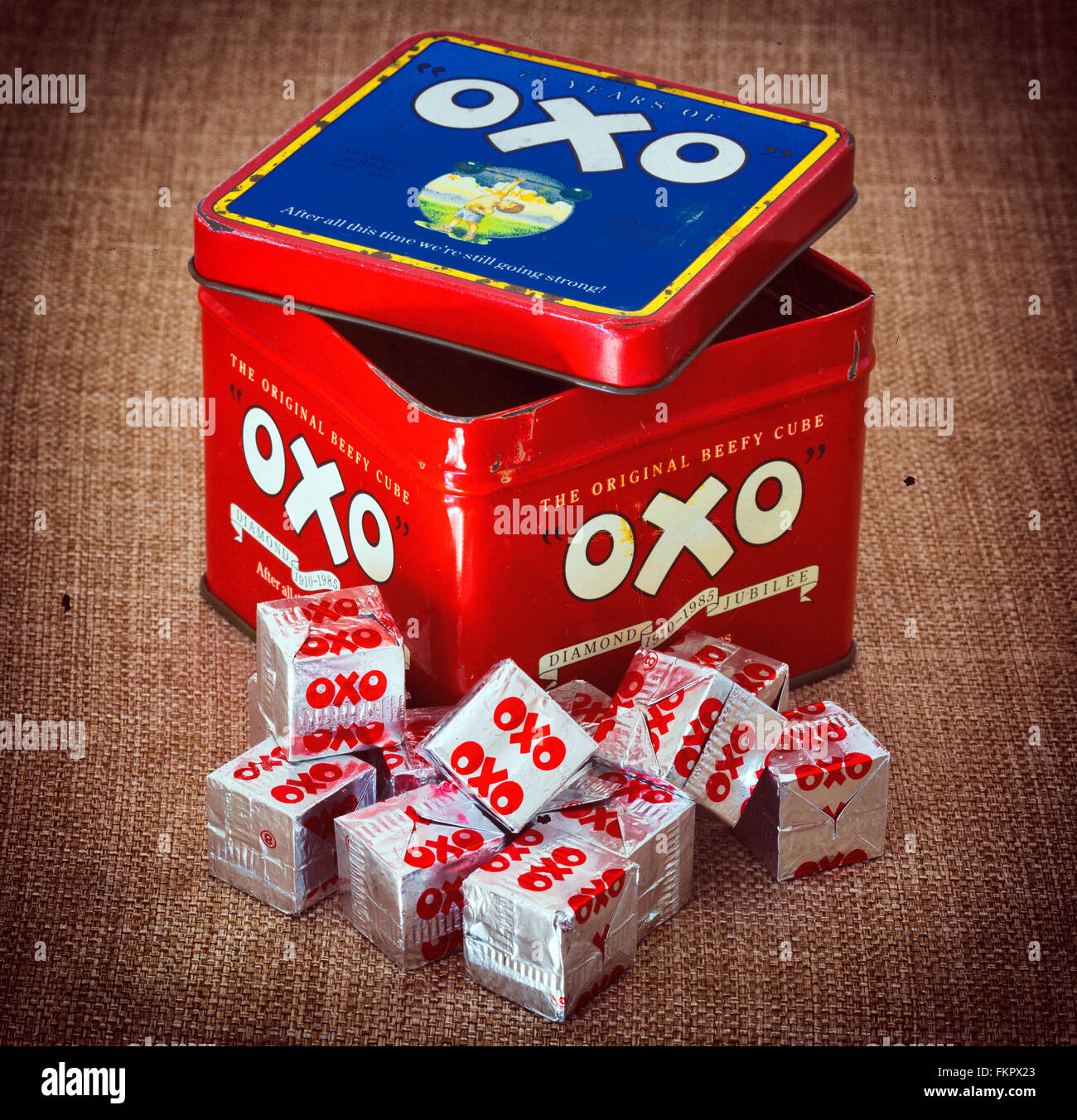 Nostalgic antique Oxo tin with modern Oxo beef stock cubes Stock Photo