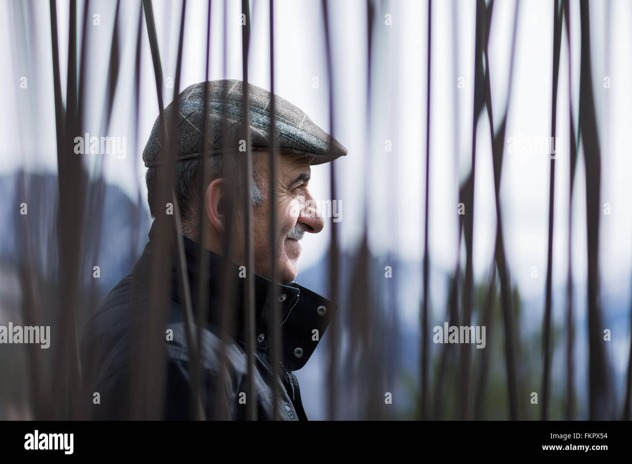 The mayor Bernard Bartolini stands in front of the memorial site for the victims of the airplane crash of Germanwings Flight 4U 9525 near the crash site in Prads-Haute-Bléone, France, 26 February 2016. The memorial consists of 149 iron rods. Photo: Rolf Vennenbernd/dpa Stock Photo