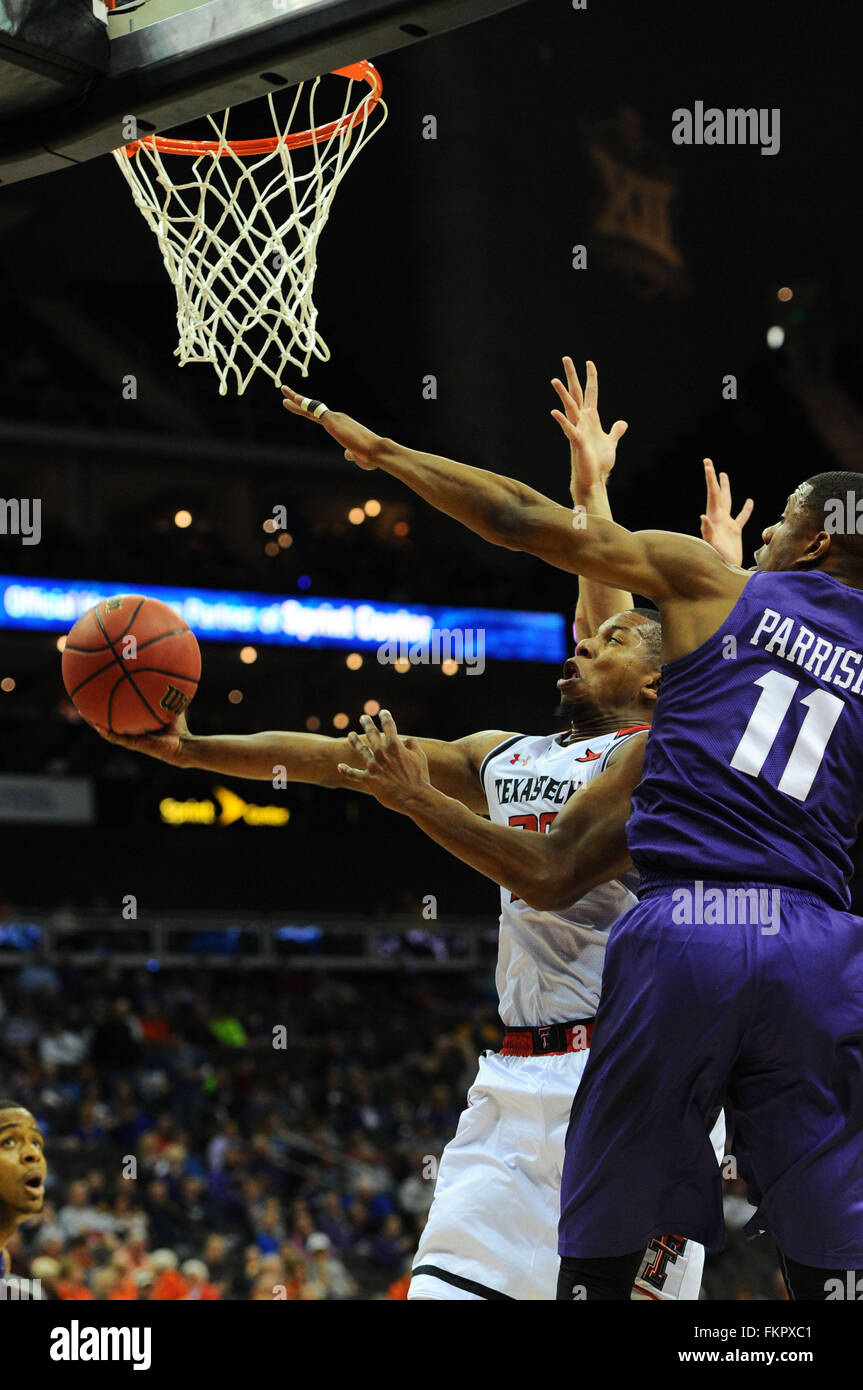 Kansas City, Missouri, USA. 09th Mar, 2016. Texas Tech Red Raiders guard Toddrick Gotcher (20) drives to the basket by TCU Horned Frogs guard Brandon Parrish (11) during the NCAA Big 12 Championships Basketball game between the Kansas State Wildcats and the Oklahoma State Cowboys at the Sprint Center in Kansas City, Missouri. Kendall Shaw/CSM/Alamy Live News Stock Photo