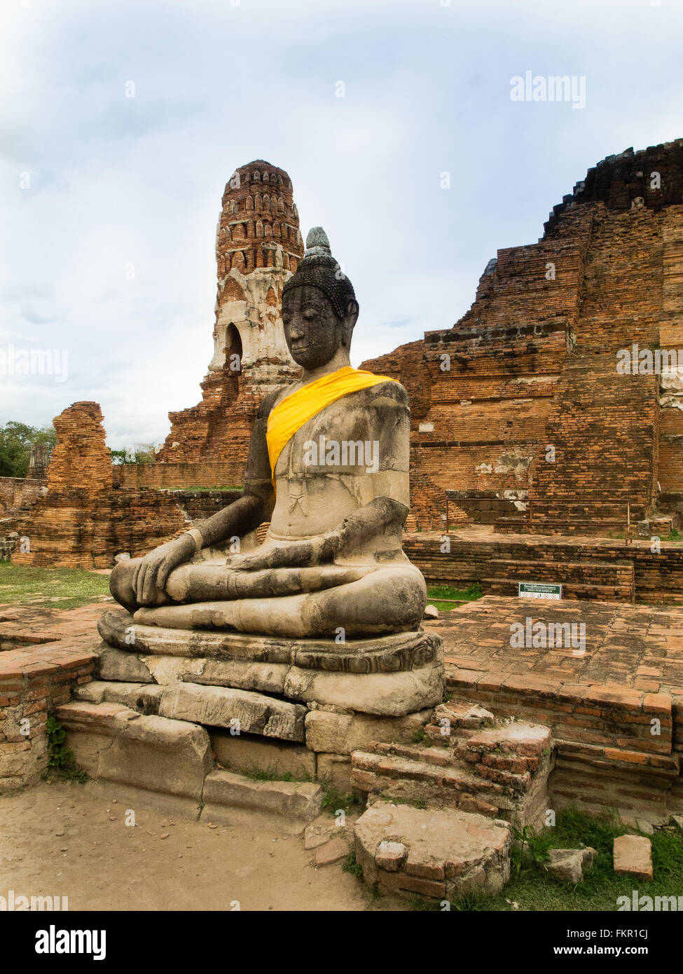 Temple buddha statue and ruins Wat Mahathat Ayutthaya Thailand Stock Photo