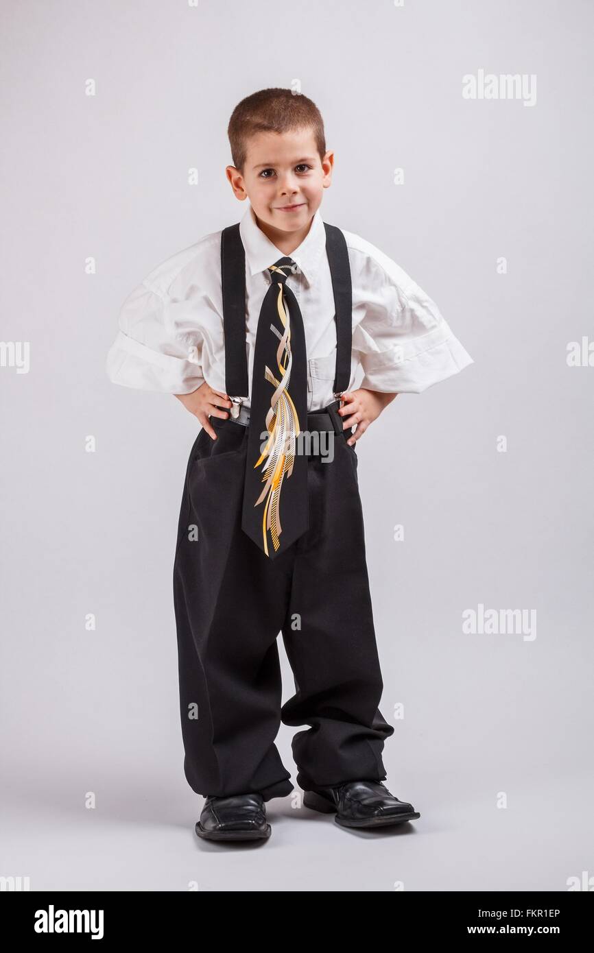 Boy in big suit hires stock photography and images Alamy