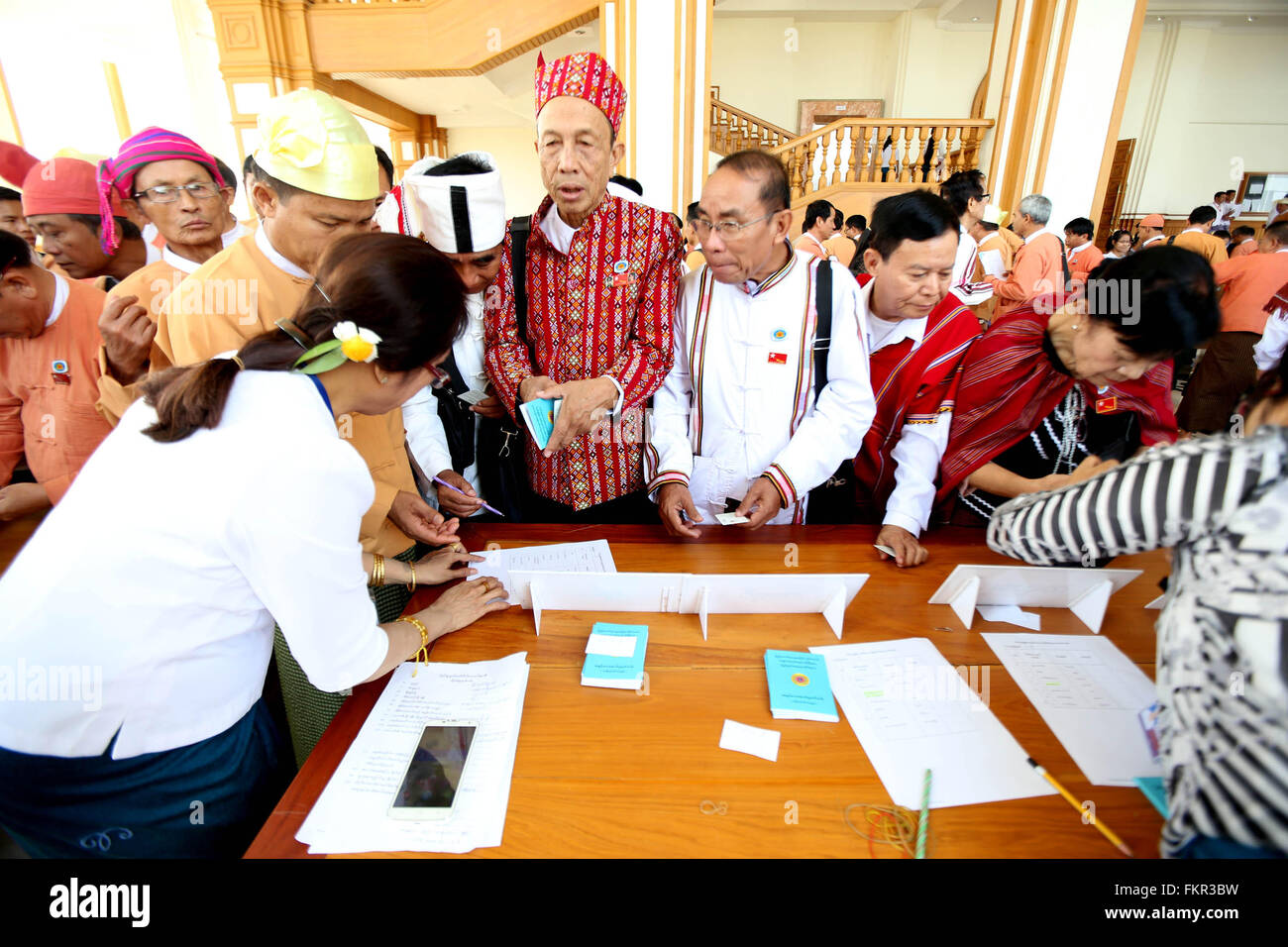 Nay Pyi Taw, Myanmar. 10th Mar, 2016. Ethnic representatives arrive to attend a session of the House of Representatives (Lower House) in Nay Pyi Taw, Myanmar, March 10, 2016. The presidential election process kicked off in Myanmar's parliament Thursday as three parliamentary groups of presidential electoral college have submitted their candidates. Credit:  U Aung/Xinhua/Alamy Live News Stock Photo