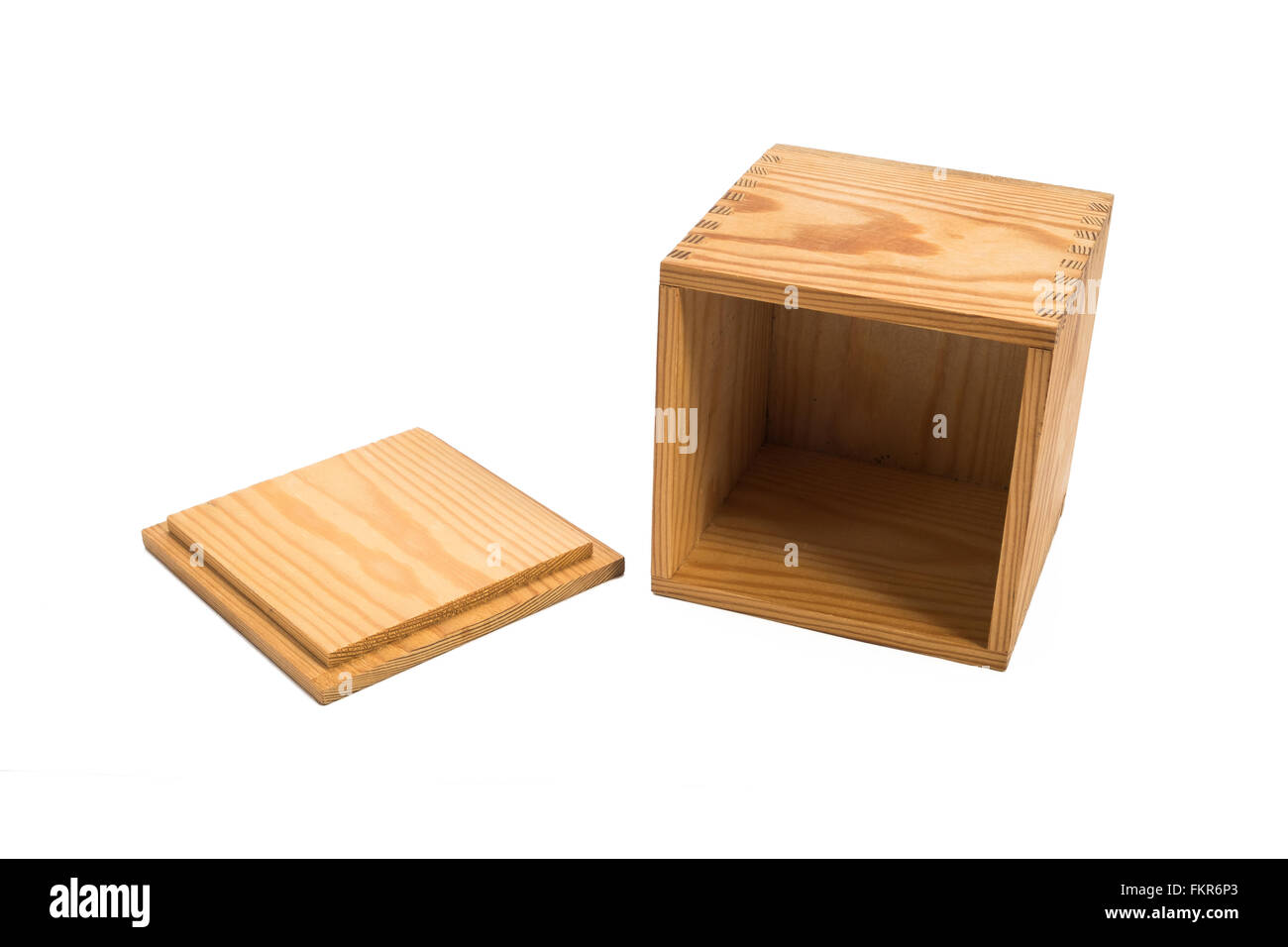 empty wooden box next to wooden lid Stock Photo