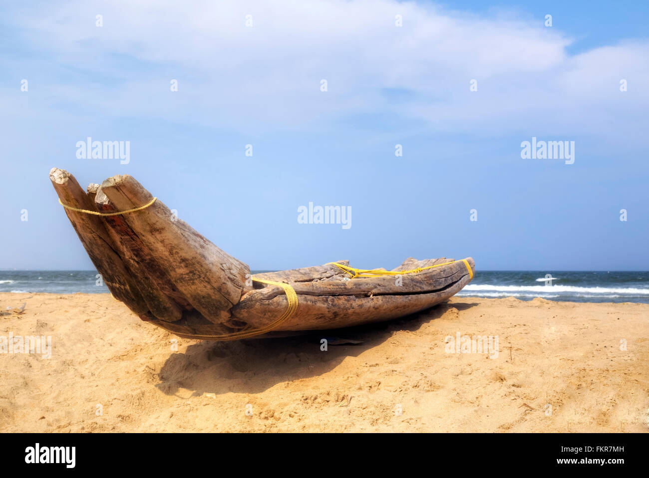 traditional wooden fishing boat on Kovalam beach, Covelong, Chennai, Tamil Nadu, India Stock Photo