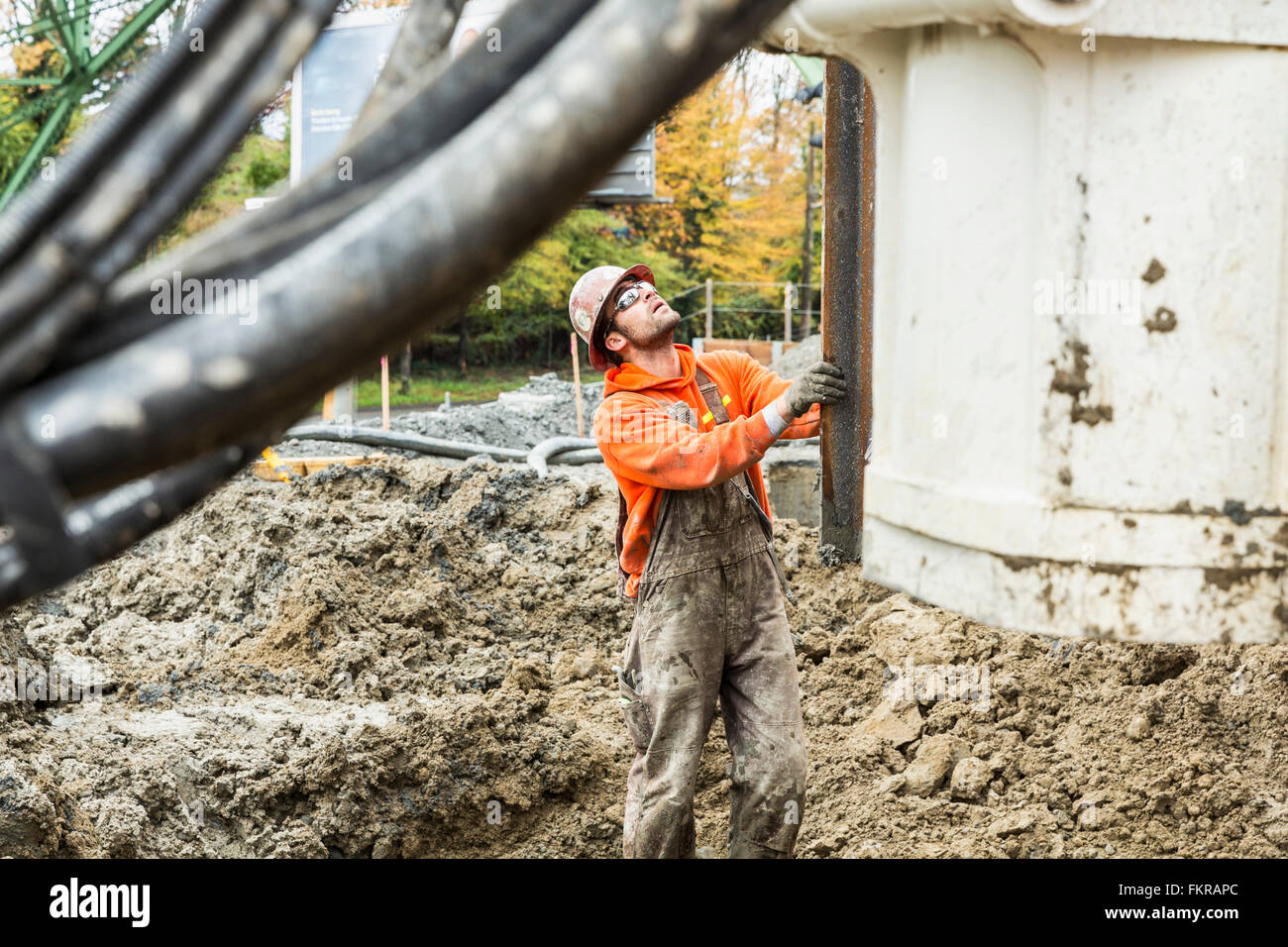 Caucasian worker at construction site Stock Photo