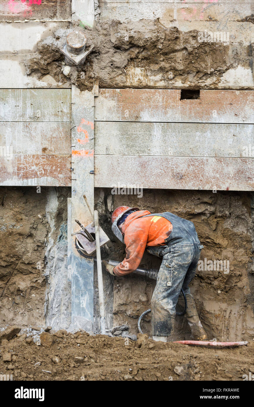 Caucasian worker at construction site Stock Photo