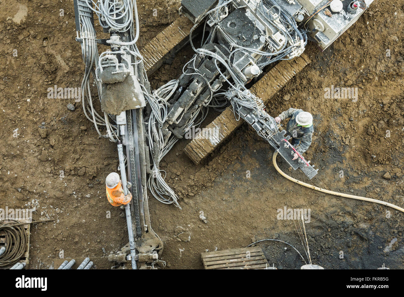 Caucasian workers at construction site Stock Photo