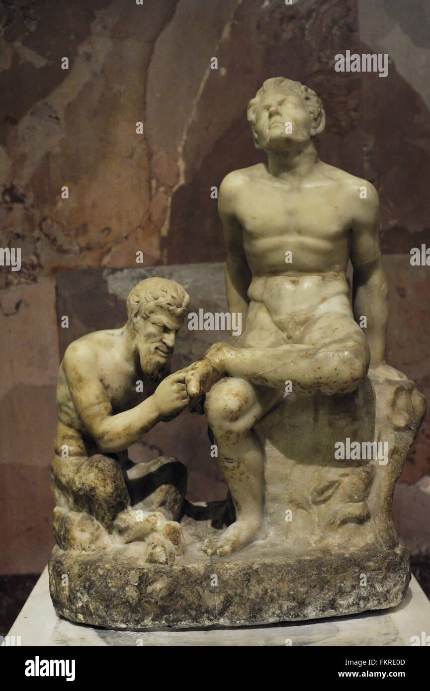 Pan pulling a thorn from the foot of a faun. Roman copy of Greek ...