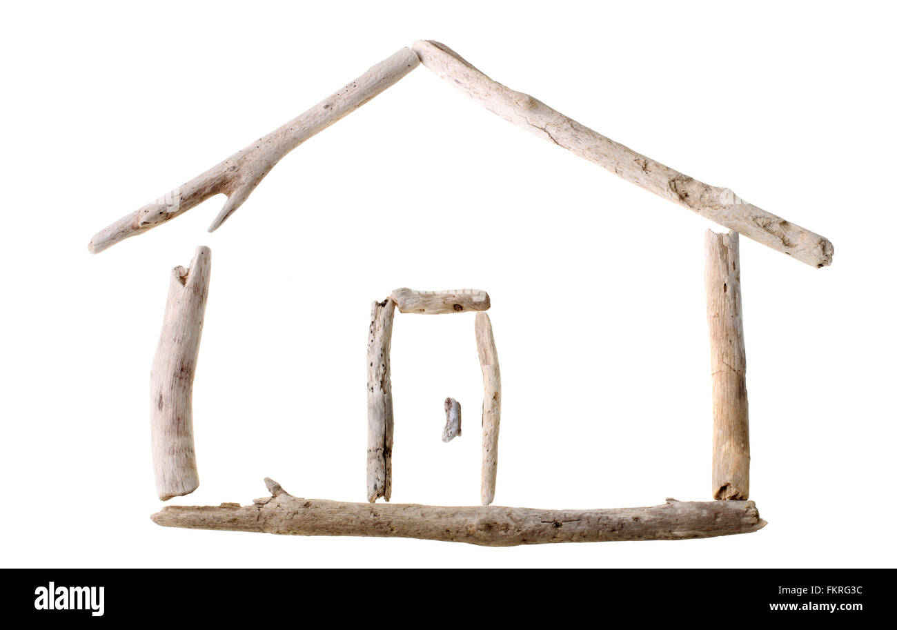 Sun bleached drift wood in shape of a house isolated on white background Stock Photo