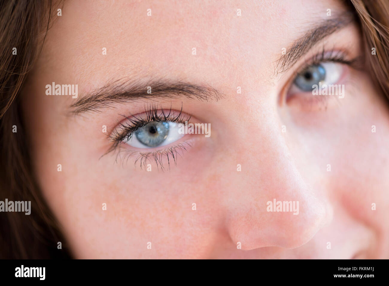 Close up of eyes and nose of Native American woman Stock Photo