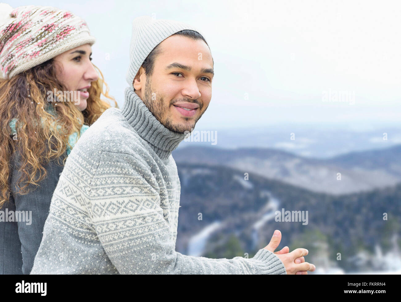Couple admiring scenic view Stock Photo