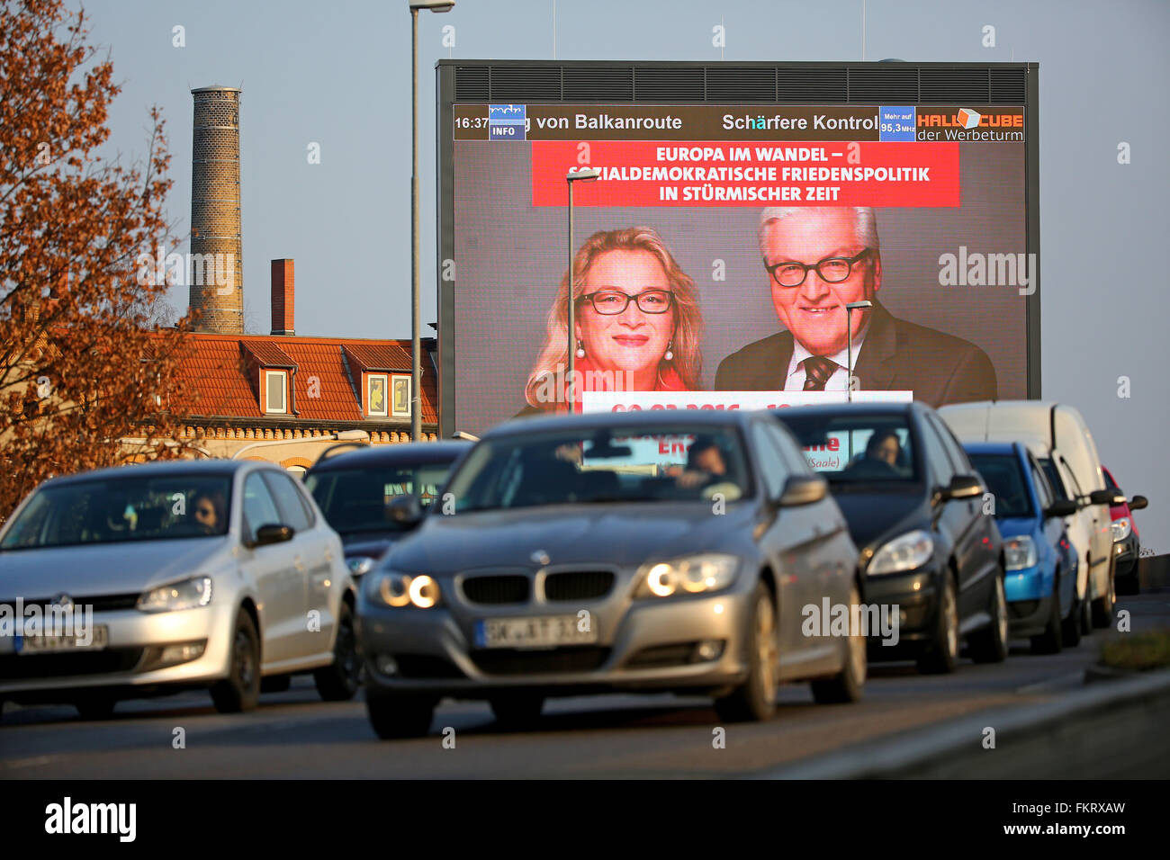 A giant LED election campaign billboard of  Saxony-Anhalt's SPD shows Germany's Foreign Minister Frank-Walter Steinmeier (SPD, R) and the SPD's top candidate Katrin Budde on display in Halle/Saale, Germany, 9 March 2016. Saxony-Anhalt's regional elections is going to be held on 13 March 2016. Photo: Jan Woitas/dpa Stock Photo