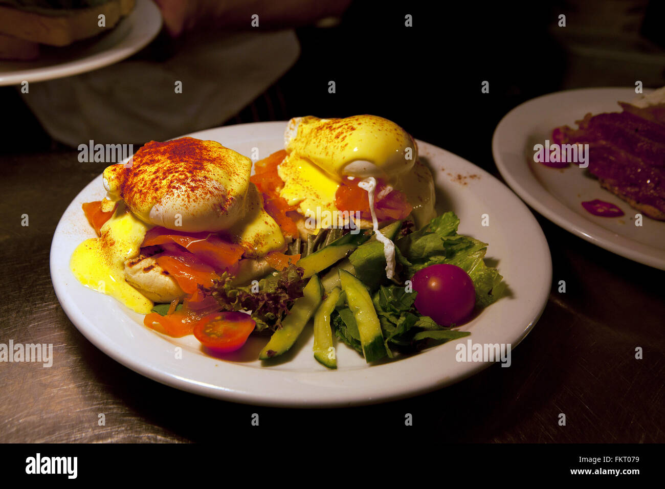 Shoreditch,London: Breakfast Club restaurant with Eggs Benedict Stock Photo