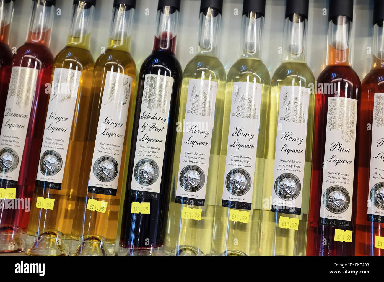 Selection of bottles of Liqueur on a supermarket shelf. Stock Photo