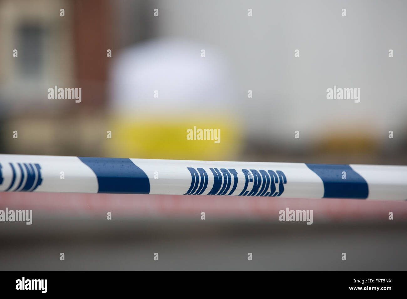 Police tape at the scene of a street crime put in place during an