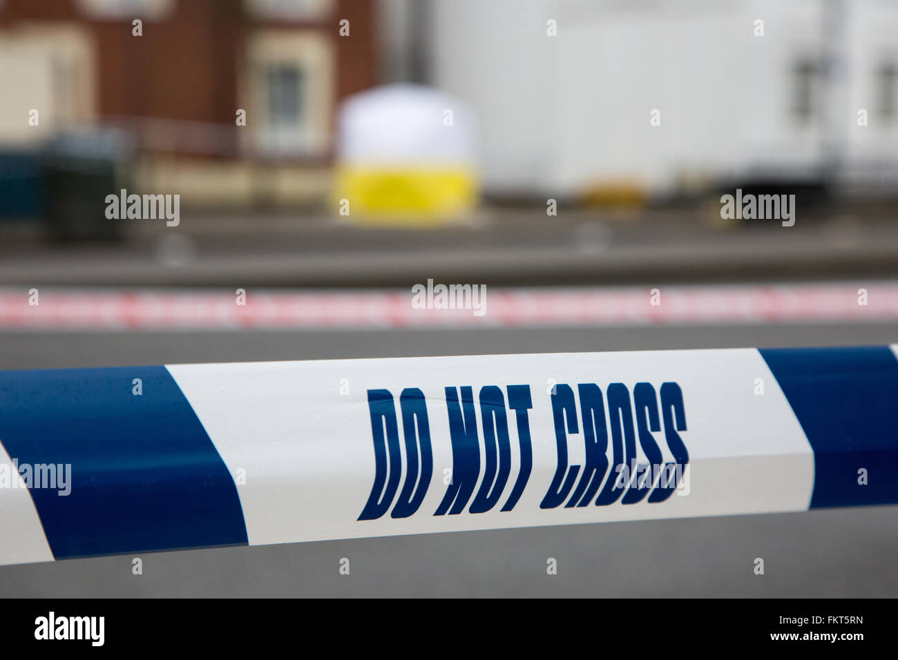 Police tape at the scene of a street crime put in place during an