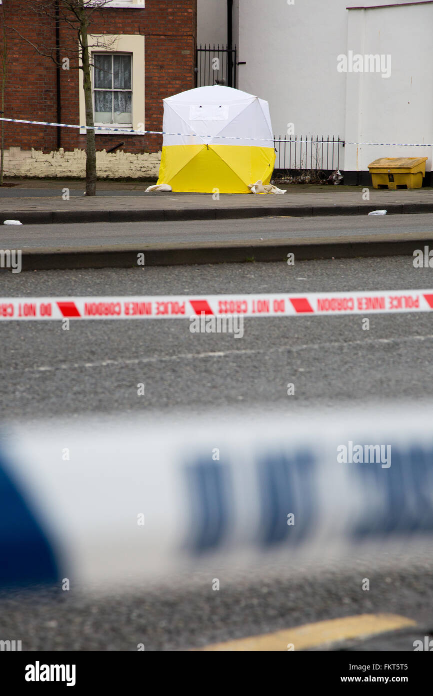 Forensic tent erected during an investigation into an murder Stock Photo