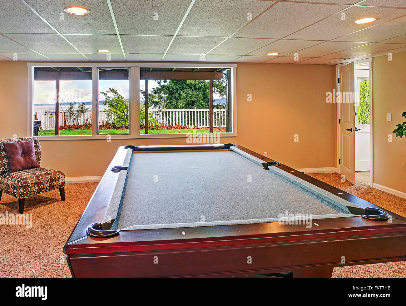 Pool table in game room Stock Photo Alamy
