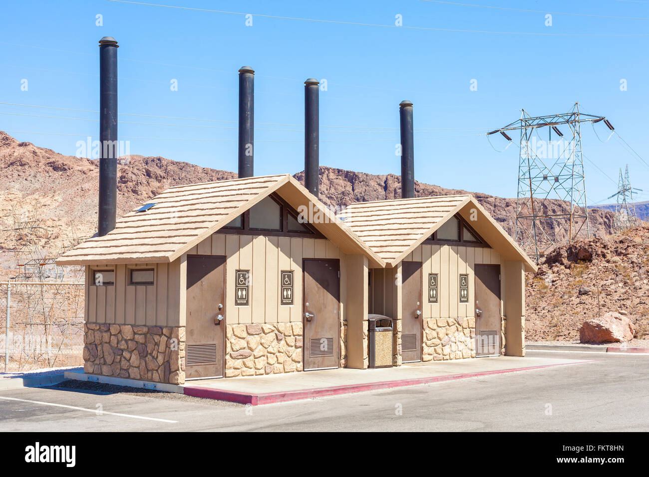 Public restroom on a parking lot, USA. Stock Photo