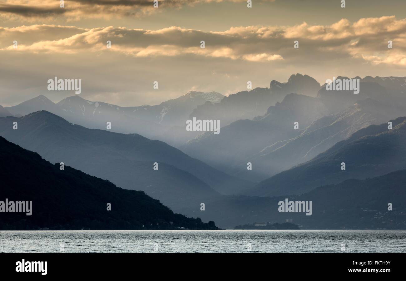Mountains in mist, Lake Maggiore, Piedmont, Lombardy, Italy Stock Photo