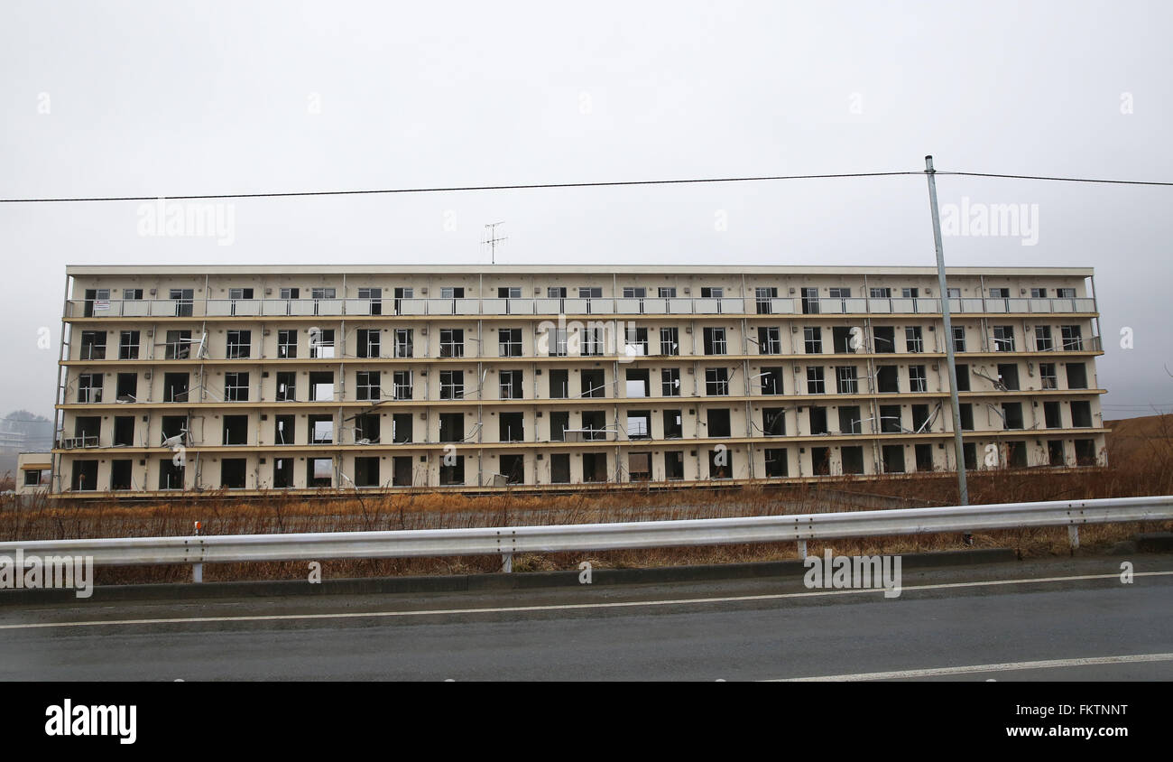 Tokyo. 6th Mar, 2016. Photo taken on March 6, 2016 shows a building damaged by tsunami in Rikuzentakata of Iwate Prefecture, northeastern Japan. Those who were evacuated after the monstrous earthquake and tsunami hit Japan's Tohoku area, or northeastern part of the island country, never imagined they'd be staying in temporary housing five years after the disaster, fighting against loneliness and diseases as public housing projects funded by the government are delayed meaning unbearable costs for those without work. © Yan Liang/Xinhua/Alamy Live News Stock Photo