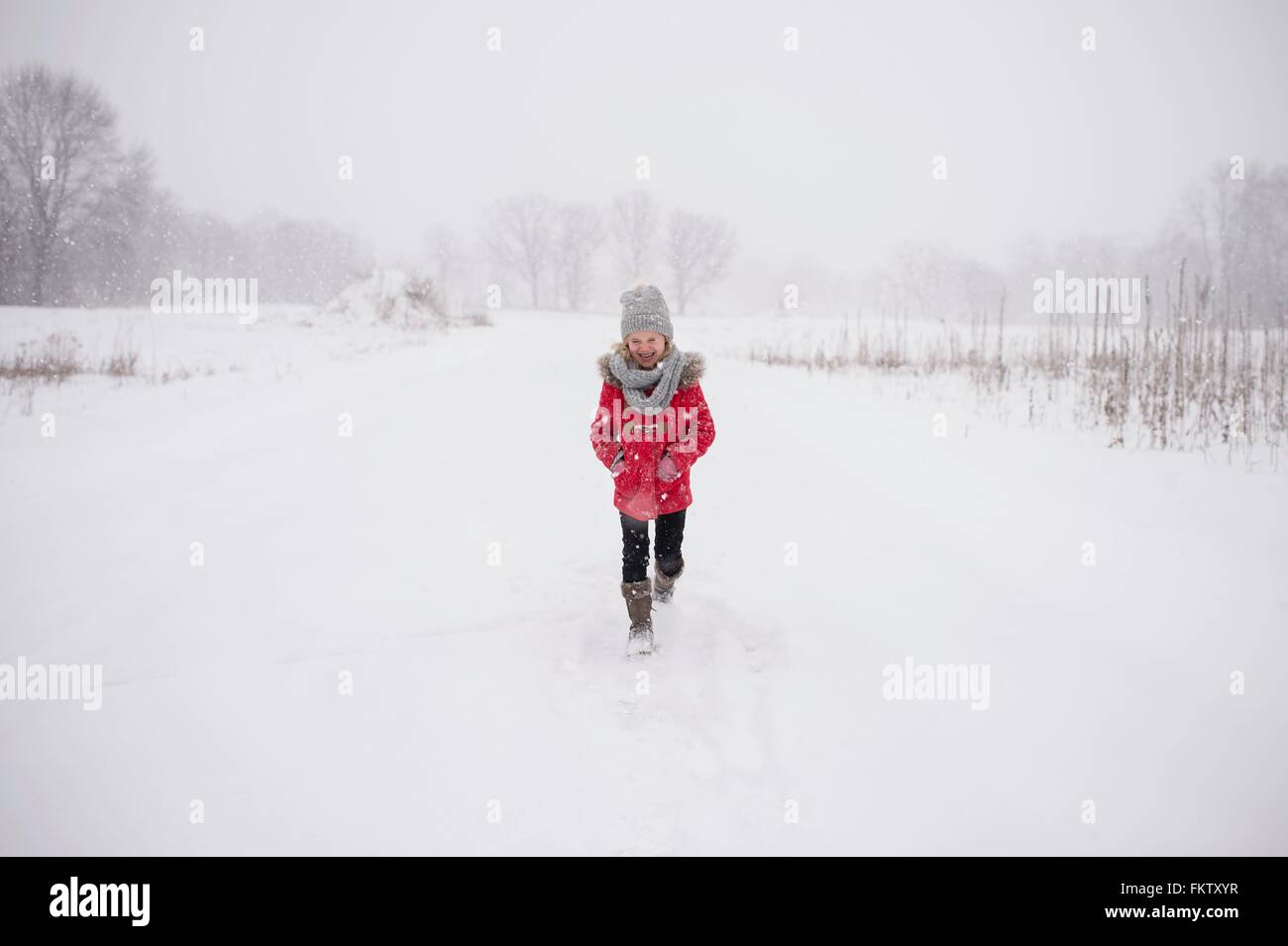 Young Girl Walking In Snow Stock Photo Alamy young-girl-walking-in-snow-stock-photo-alamy