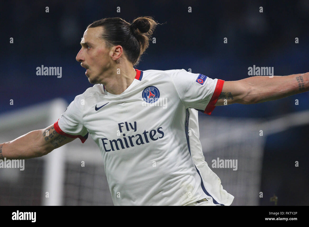 Zlatan Ibrahimovic of Paris Saint-Germain celebrates scoring during the UEFA Champions League round of 16 match between Chelsea and Paris Saint-Germain at Stamford Bridge in London. March 9, 2016. Arron Gent / Telephoto Images +44 7967 642437 Stock Photo