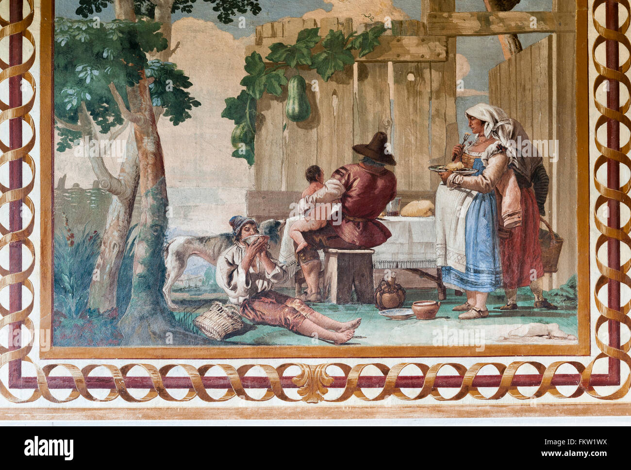 Villa Valmarana ai Nani, Italy. Fresco by Giandomenico Tiepolo in the Foresteria (guesthouse). Family Meal Stock Photo