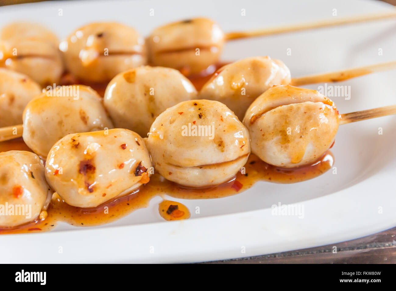 Grilled meat ball with spicy sauce in Thai stlye,selective focus Stock Photo