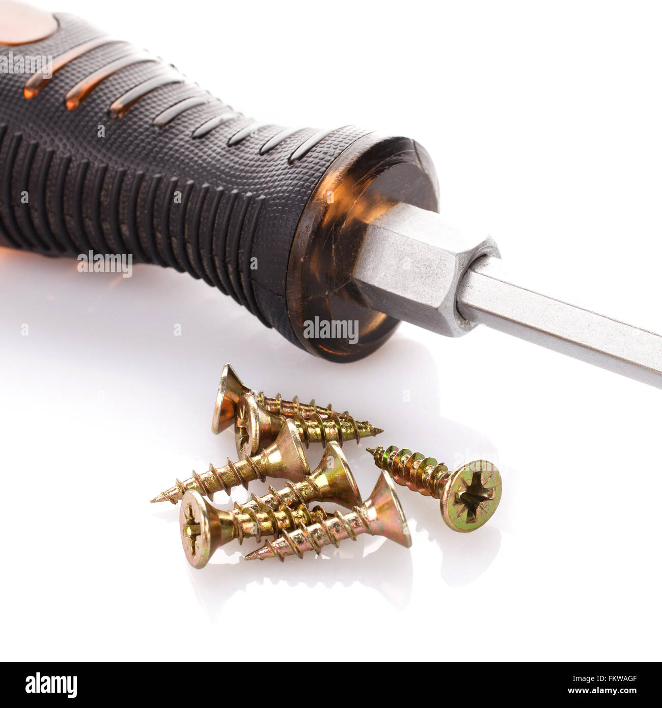 Screws and screwdriver Stock Photo