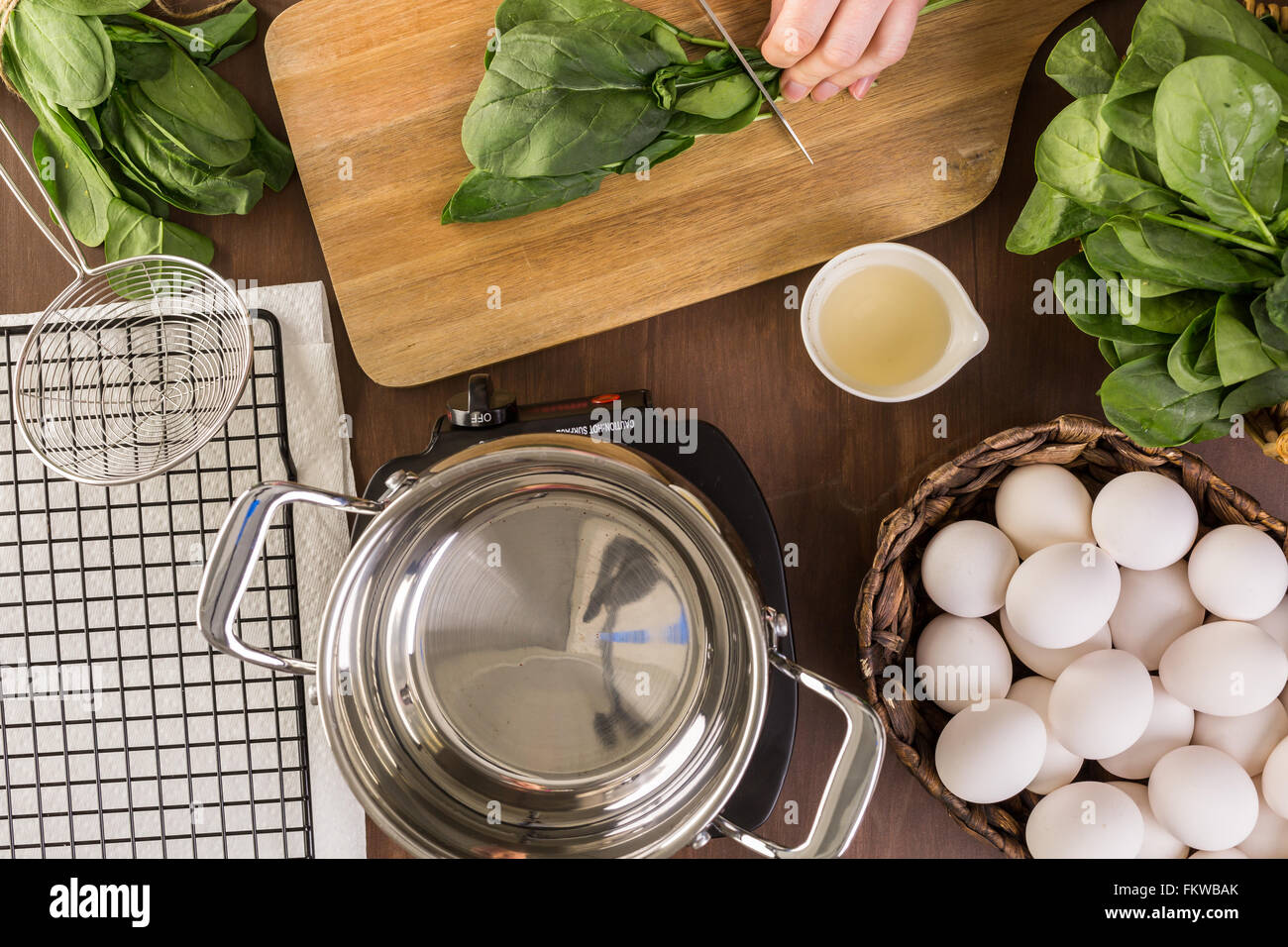 Dyeing Easter eggs with natural dye from spinach Stock Photo Alamy