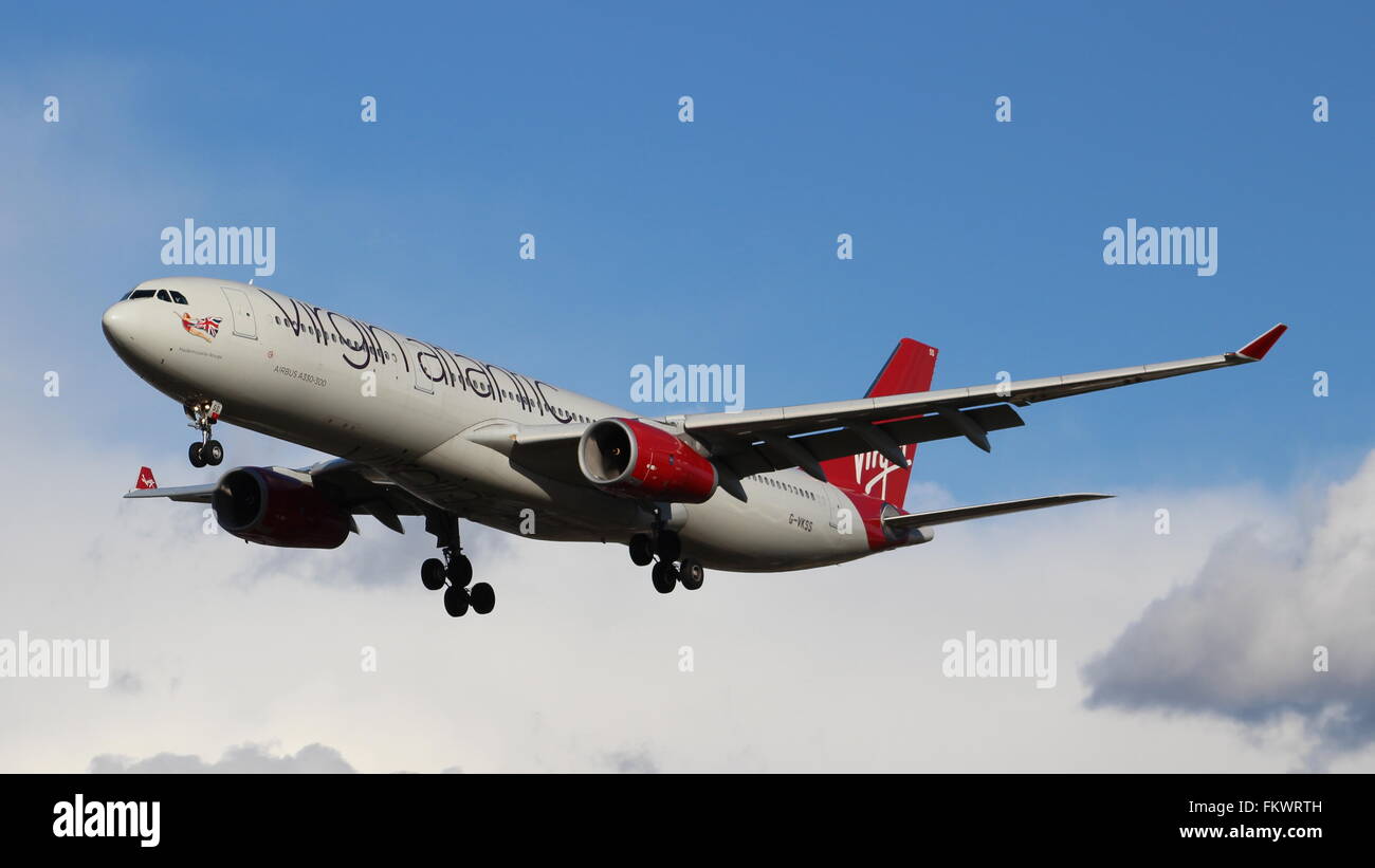 Virgin Atlantic Landing at London heathrow airport Stock Photo